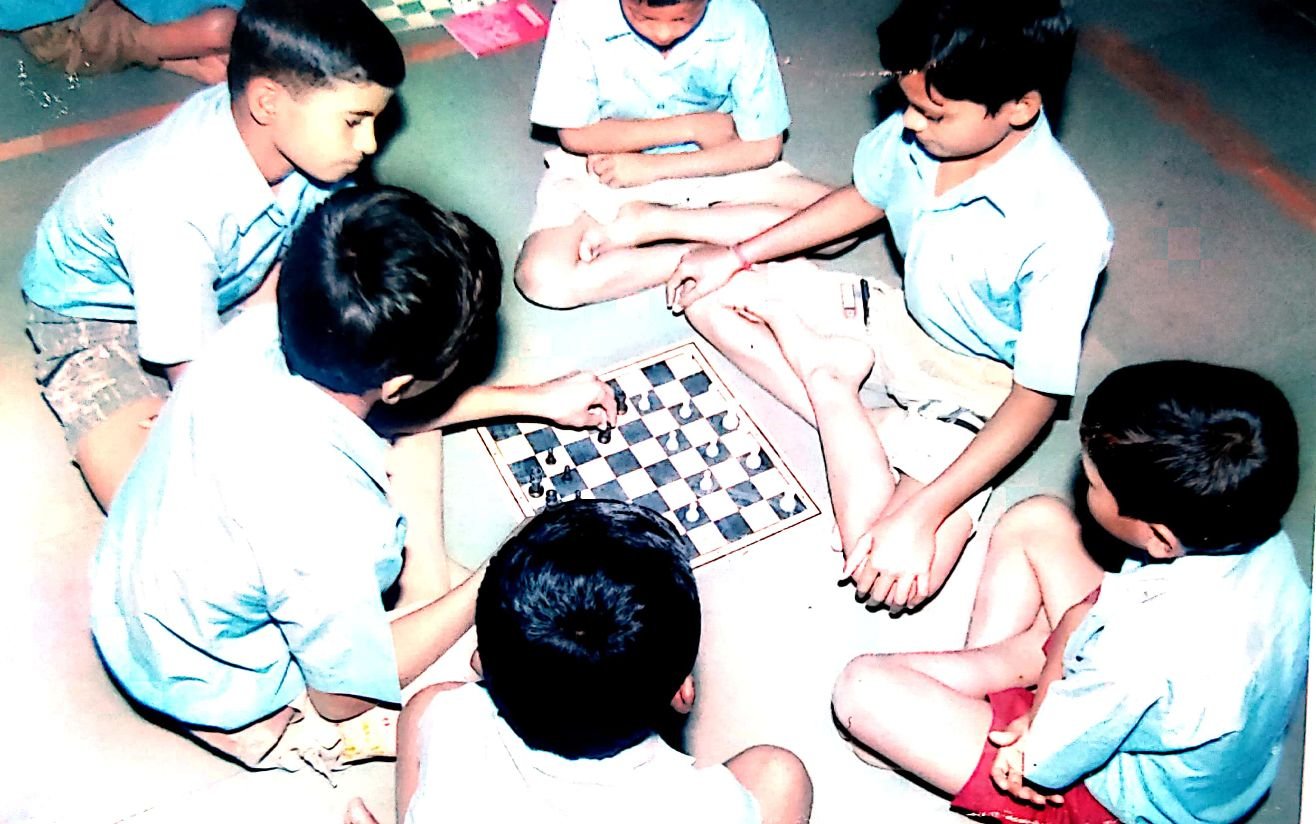 Students playing chess